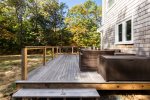 Comfortable outdoor furniture on wrap-around deck